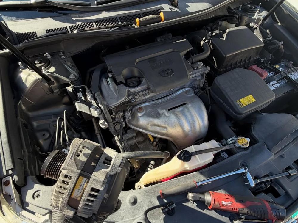 Open engine bay with the front-of-engine accessories accessible
